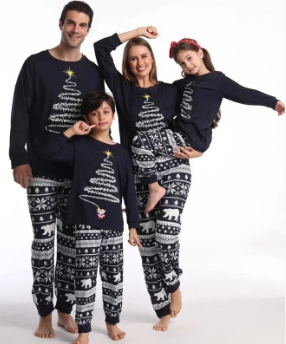 Matching family Christmas pajamas with firework print for the whole family